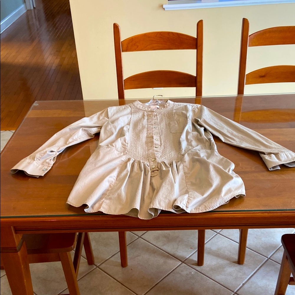 Beautiful Khaki Colored Blouse with many details including pockets.